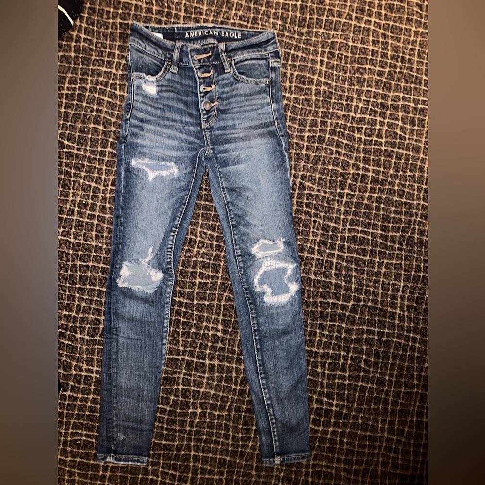 American Eagle size 0 skinny jeans with light rips